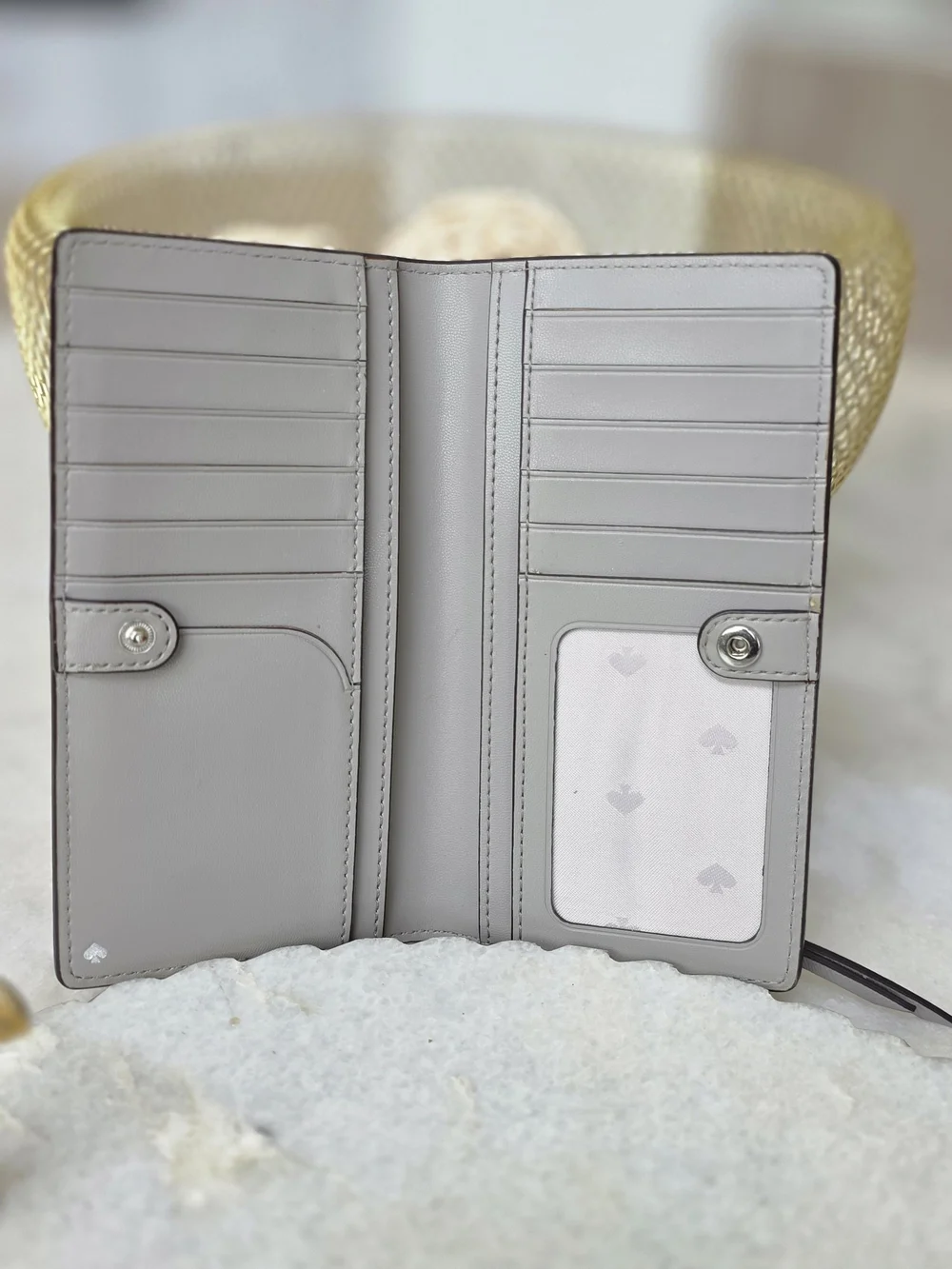 Kate Spade New York Gray Saffiano Large Slim Bifold Wallet Silver Logo